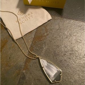 Camry long necklace with smoke gray drop pendant. Gold